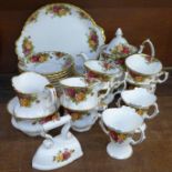 A Royal Albert Old Country Roses six setting tea set with sandwich plate, cream, sugar and teapot,