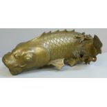 An oriental bronze model of a carp, 23.5cm