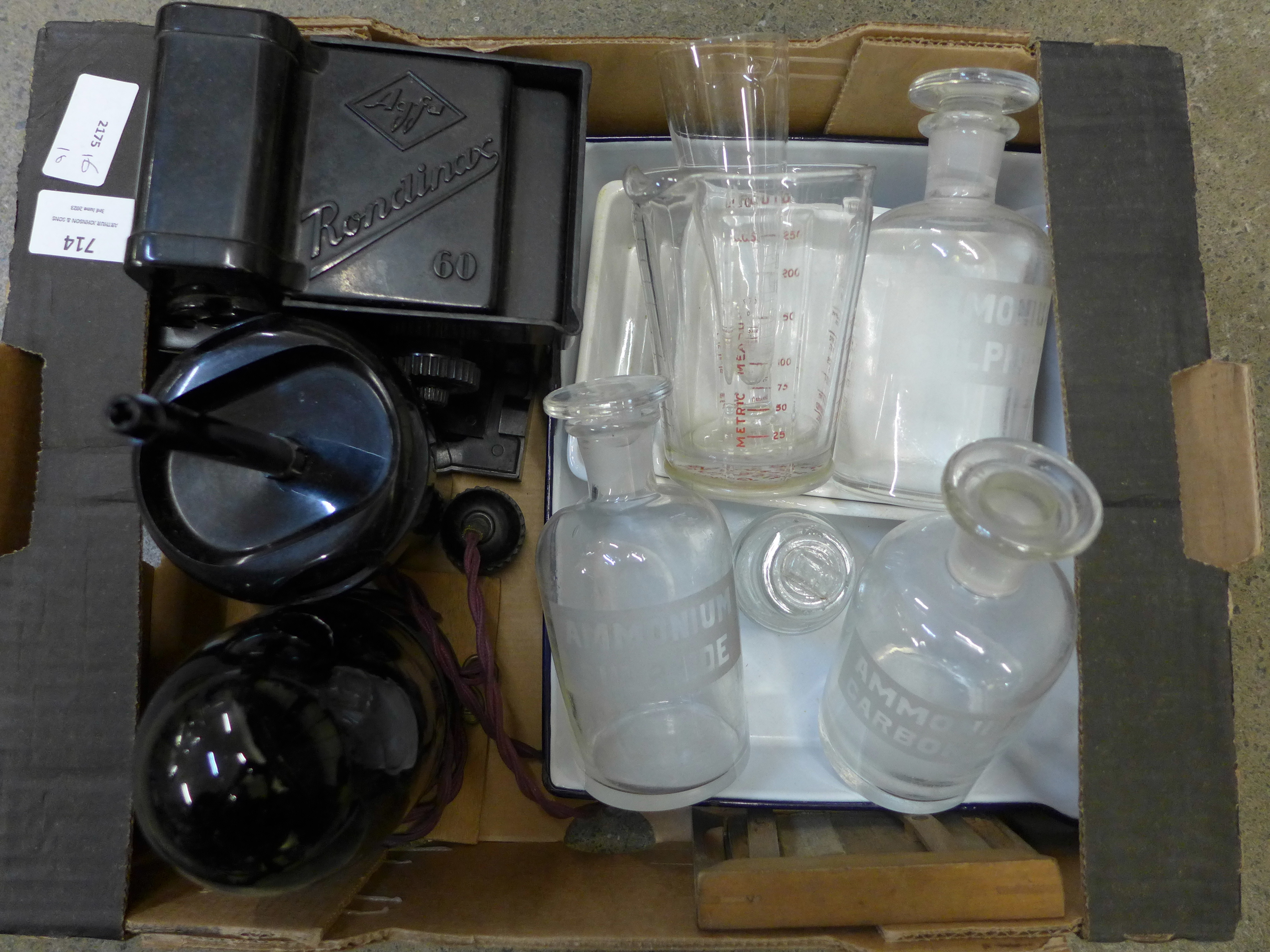 Vintage photographic darkroom equipment and bottles