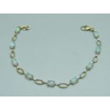 A silver gilt Ethiopian opal tennis bracelet, opal weight approximately 3.10ct