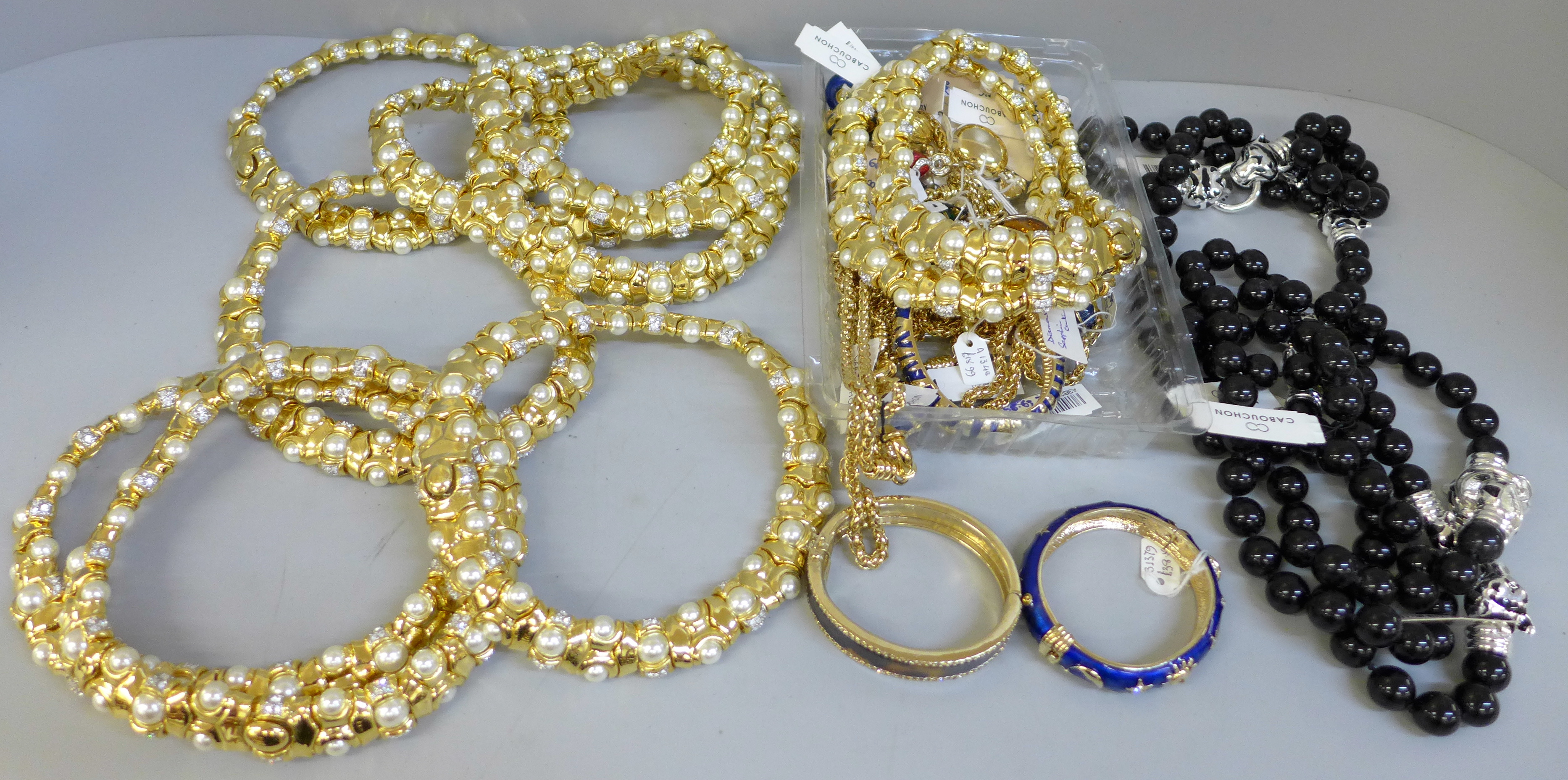 Ten gold tone collars set with faux pearls and other gold tone jewellery including Cabouchon