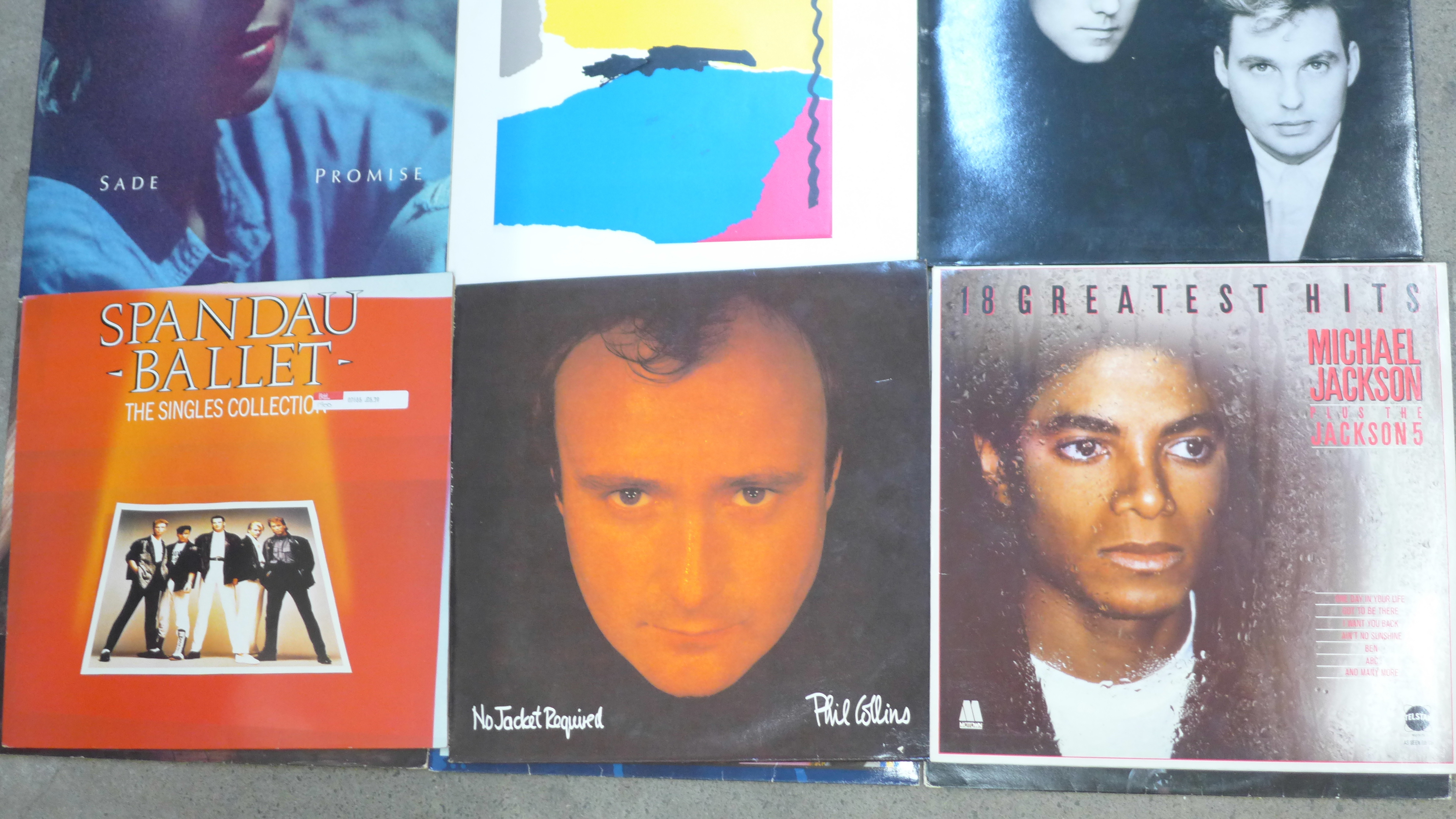 Twelve 1980s LP records including The Jam, U2, Kate Bush, Sade, Roxy Music, etc. - Image 2 of 2