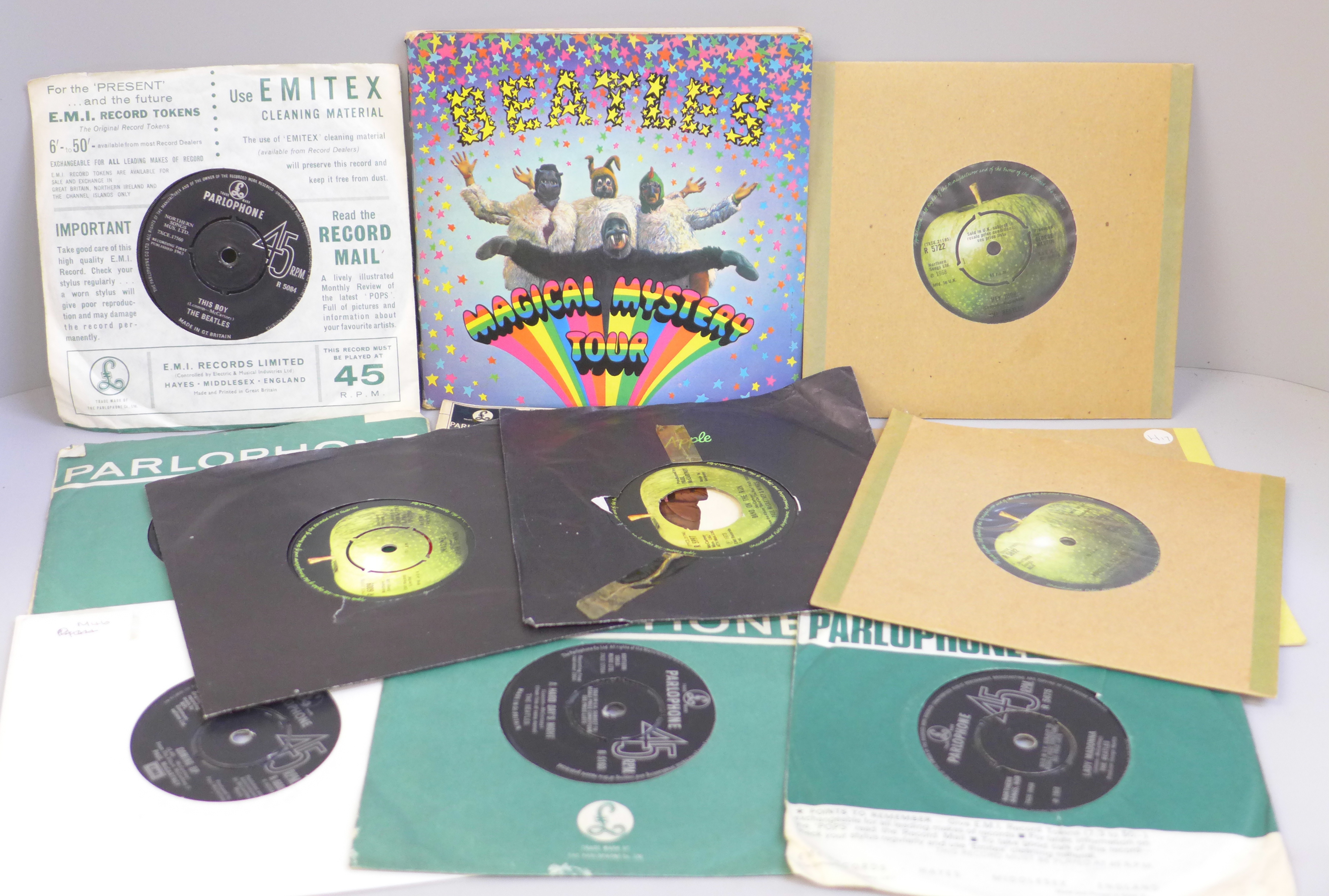 A collection of twelve The Beatles and related 7" singles including two EPs, Magical Mystery Tour,