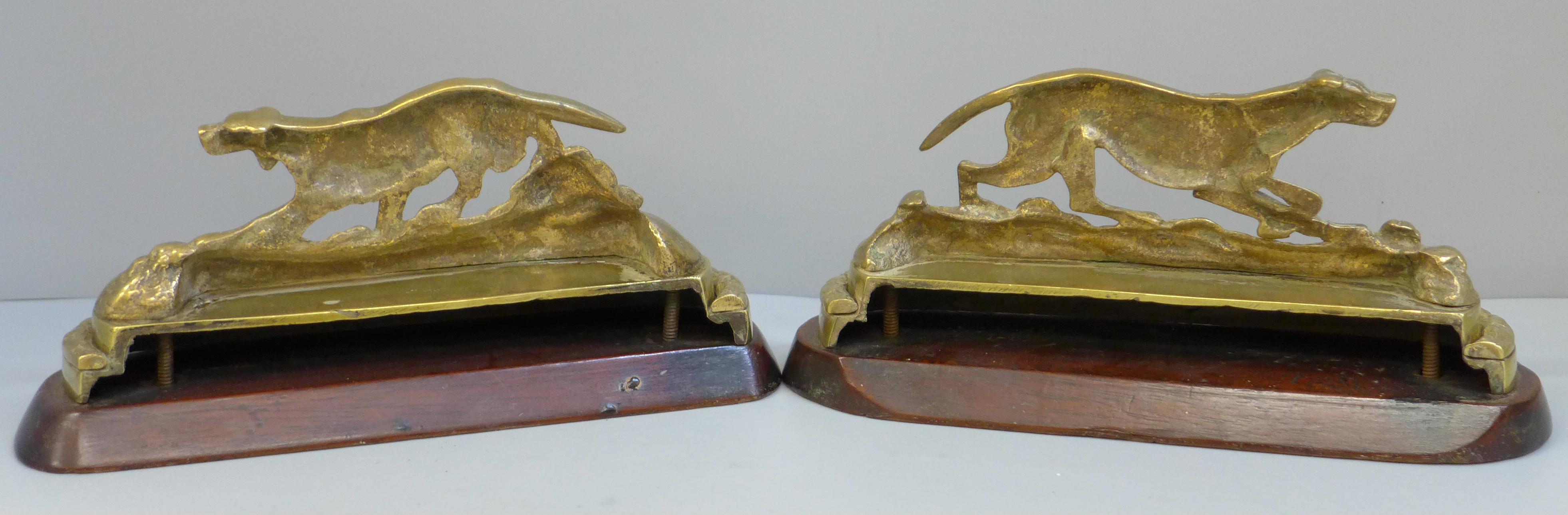 A pair of Victorian brass gun dogs on mahogany bases with traces of original gilding, 21cm - Image 4 of 4