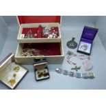 A jewellery box with contents including silver, St. Justin, etc.