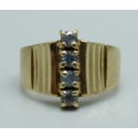 A 9ct gold, four blue stone ring, 6.5g, Q