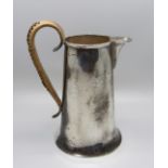 A silver jug, worn Chester marks, 142g