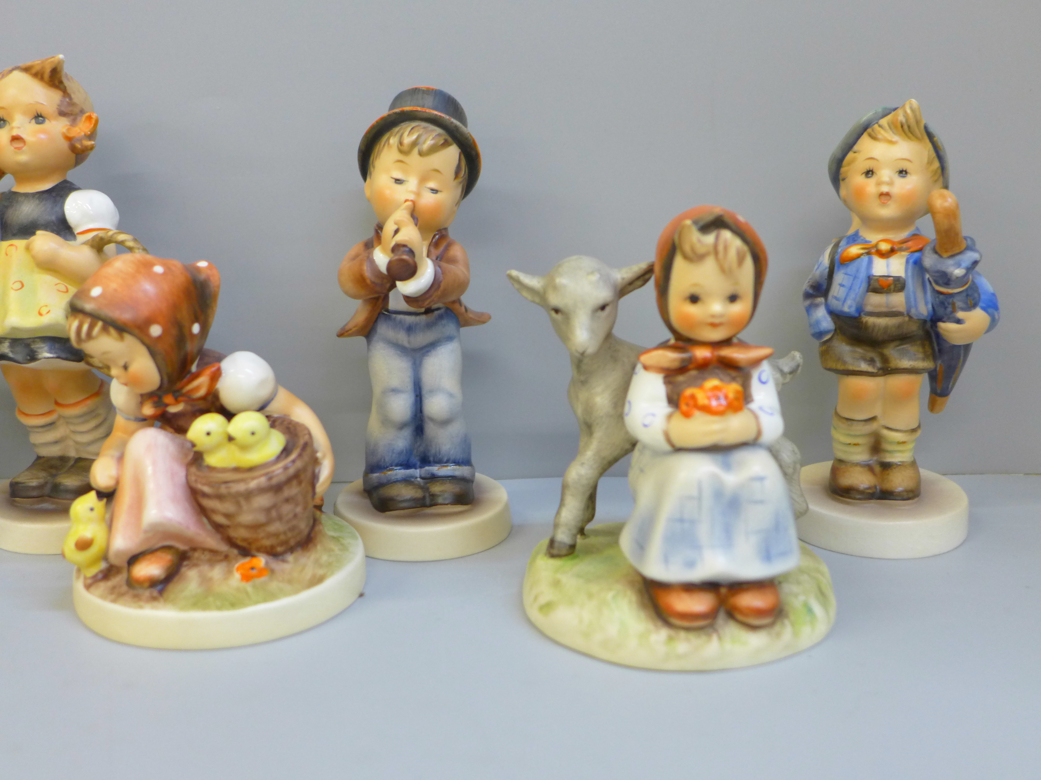 Eight Hummel/Goebel figures, two a/f, small chip to umbrella and to base - Image 3 of 5