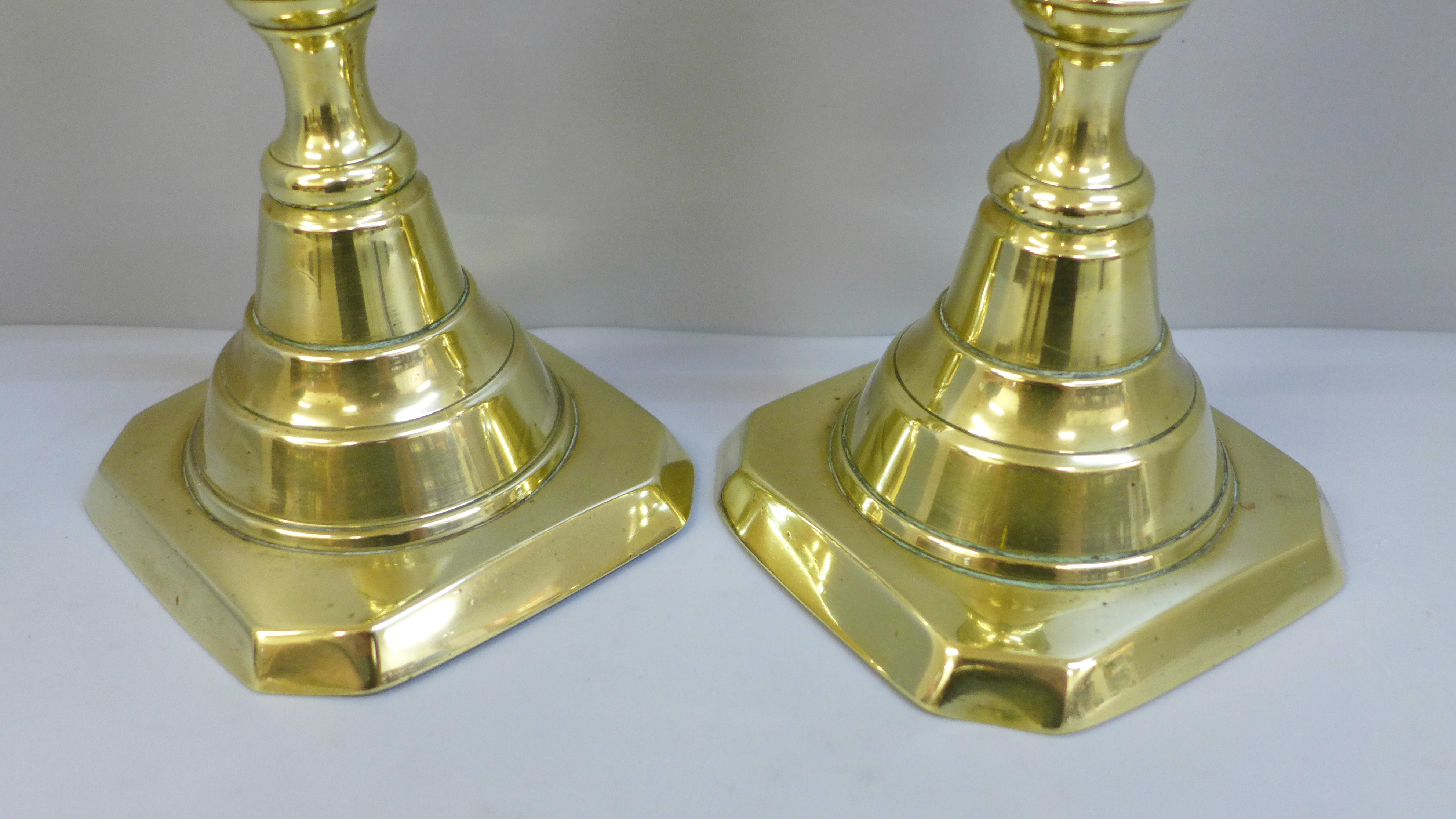 A pair of 19th Century Queen of Diamonds pattern brass candlesticks, 30cm - Image 2 of 2