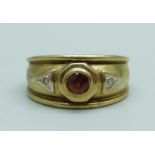 A 9ct gold, red stone and diamond ring, 3.5g, L