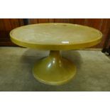 An Arkana style fibreglass tulip shaped coffee table