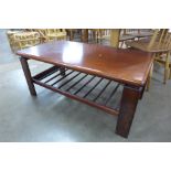 A simulated rosewood coffee table