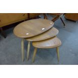 An Ercol Blonde elm and beech pebble shaped nest of tables