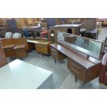 Two White & Newton tola wood dressing tables and a pair of bedside tables