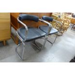 A pair of Italian chrome and black vinyl cantilever armchairs