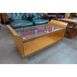 A G-Plan teak and glass topped rectangular tulip coffee table