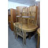 A Nathan teak extending dining table and a set of six chairs