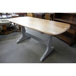 A painted Ercol elm and beech refectory table