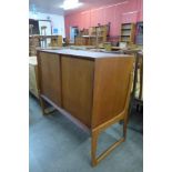 A Danish teak two door side cabinet