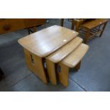 An Ercol Blonde ash nest of tables