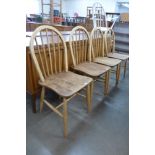A set of four Ercol elm and beech Windsor chairs
