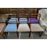 A set of six teak dining chairs