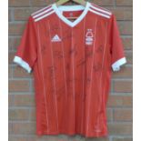 A signed Nottingham Forest shirt containing signatures from seventeen members of the 2018-19 squad