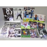 Thirty-six signed photographs of West Ham United footballers, including Martin Peters, Billy