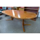 A Danish teak extending dining table