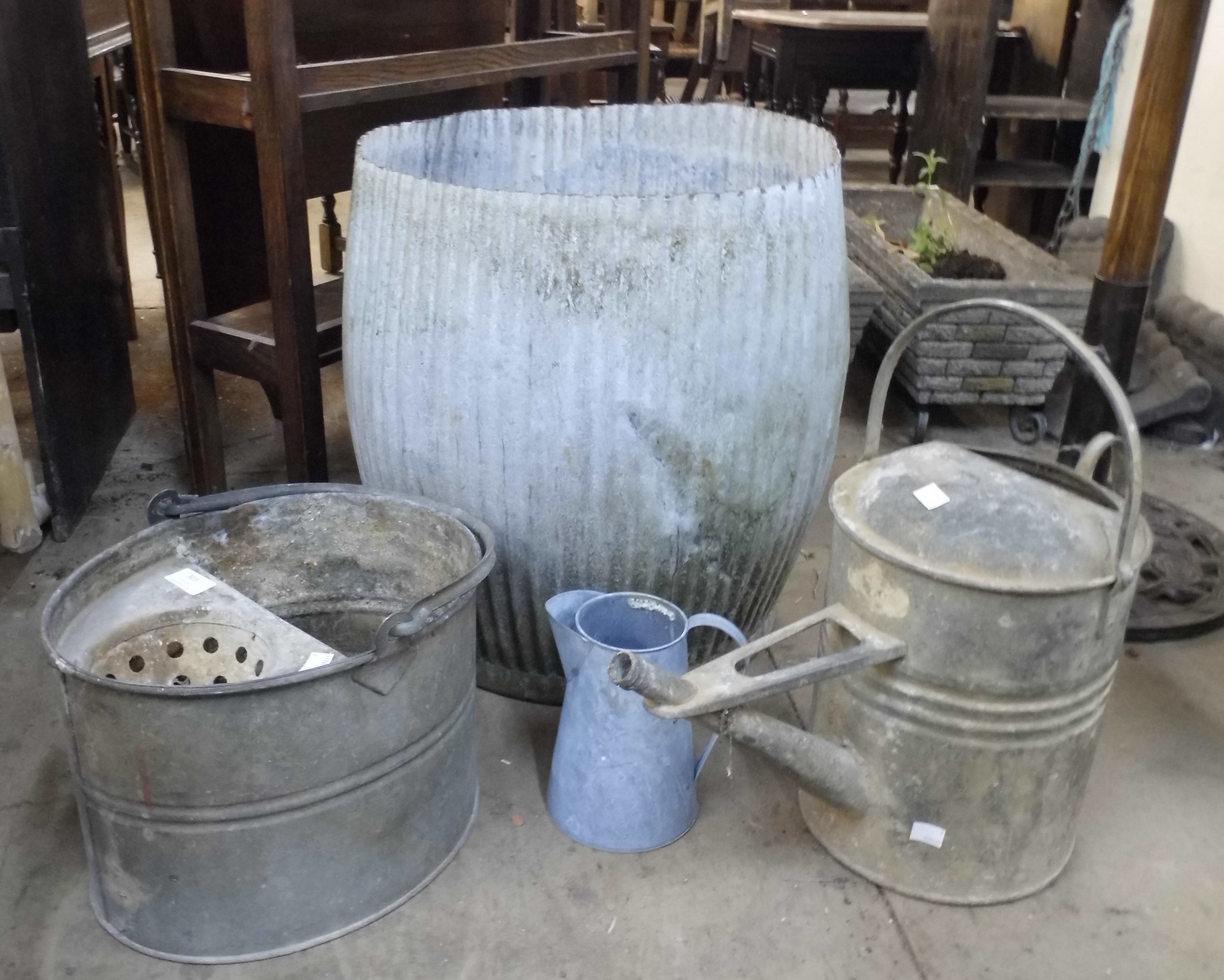 A galvanised dolly tub, mop bucket, etc.