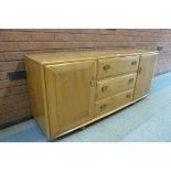 An Ercol Blonde elm Windsor sideboard