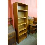 A teak open bookcase