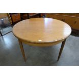 A G-Plan Fresco teak circular extending dining table