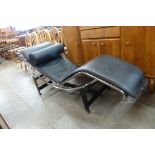A Le Corbusier style chrome and black leather and relax chair