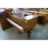 An early 20th Century Beulhoff walnut Baby Grand piano. This lot is sold with non-transferable