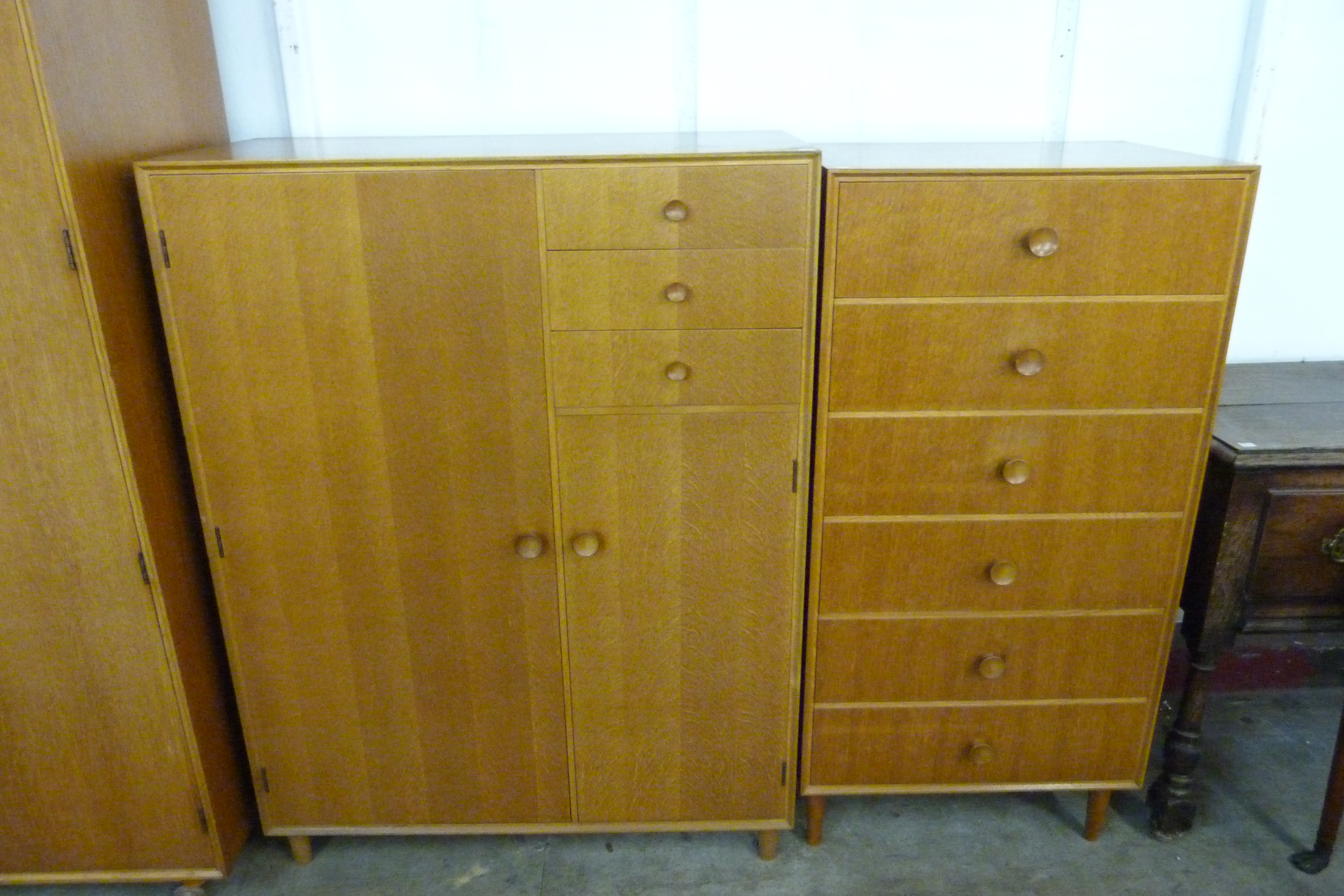 A Meredew oak four piece bedroom suite, comprising; wardrobe, tallboy, dressing table and a chest of - Image 4 of 5