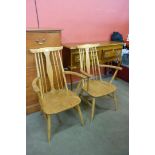 A pair of Ercol style Blonde elm and beech chairs