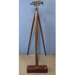 A Charles Baker surveyor's brass theodolite/level with case and mahogany tripod stand