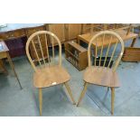 A pair of Ercol Blonde elm and beech Windsor chairs