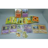A collection of Pokemon cards including base set, etc.