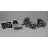 A pair of Kienzle car clocks and four others