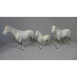 Three Beswick dapple grey horses, smallest with one back leg restored and largest with one front leg