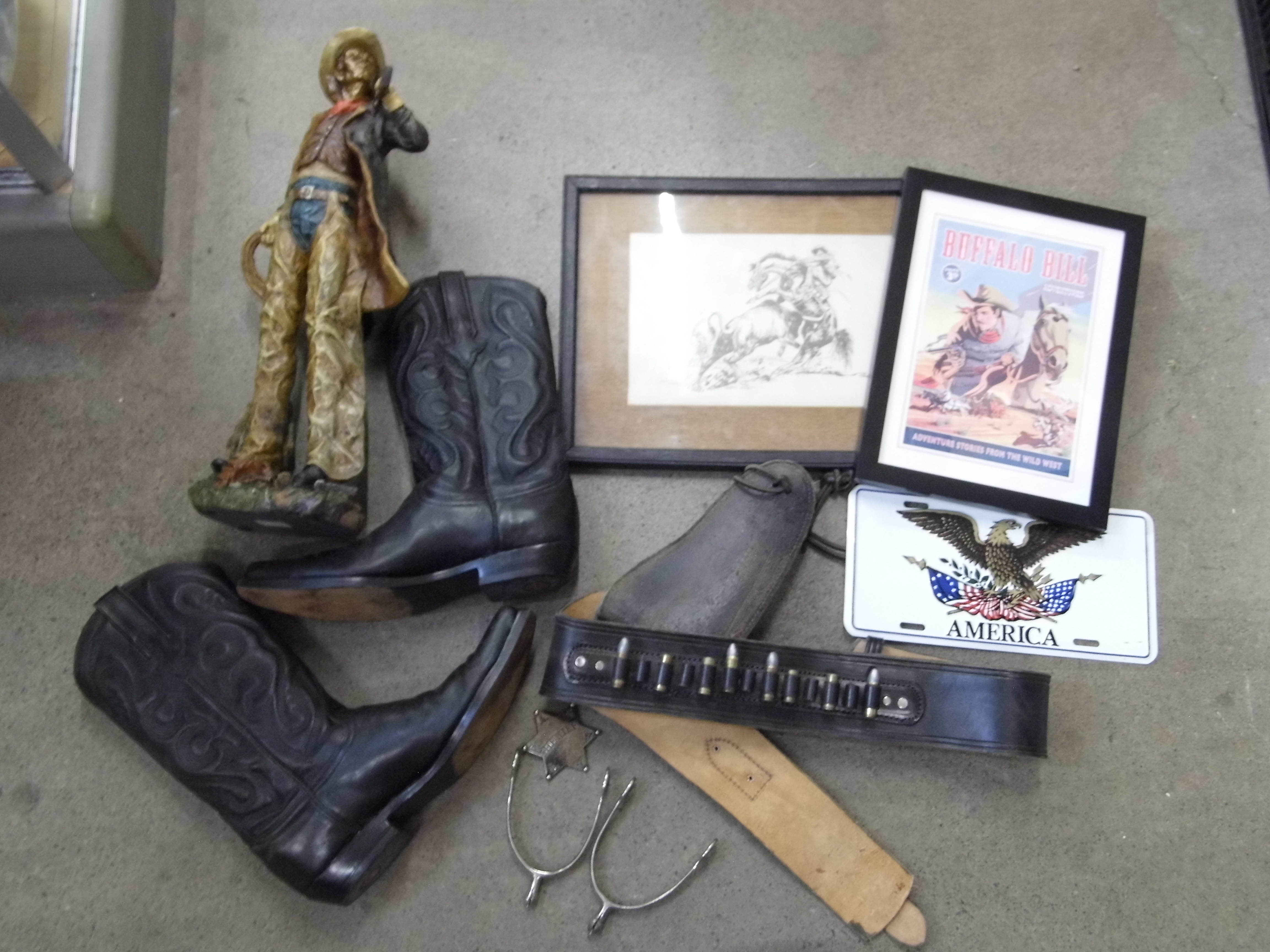 A collection of Americana; cowboy boots, gun holster, a figure of a cowboy, etc.