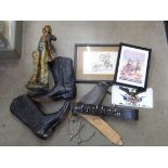 A collection of Americana; cowboy boots, gun holster, a figure of a cowboy, etc.