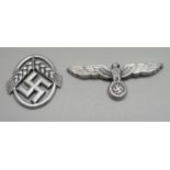 A German WWII period badge, female National labour-service and a winged badge, lacking pins