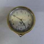 A brass cased Smiths car clock