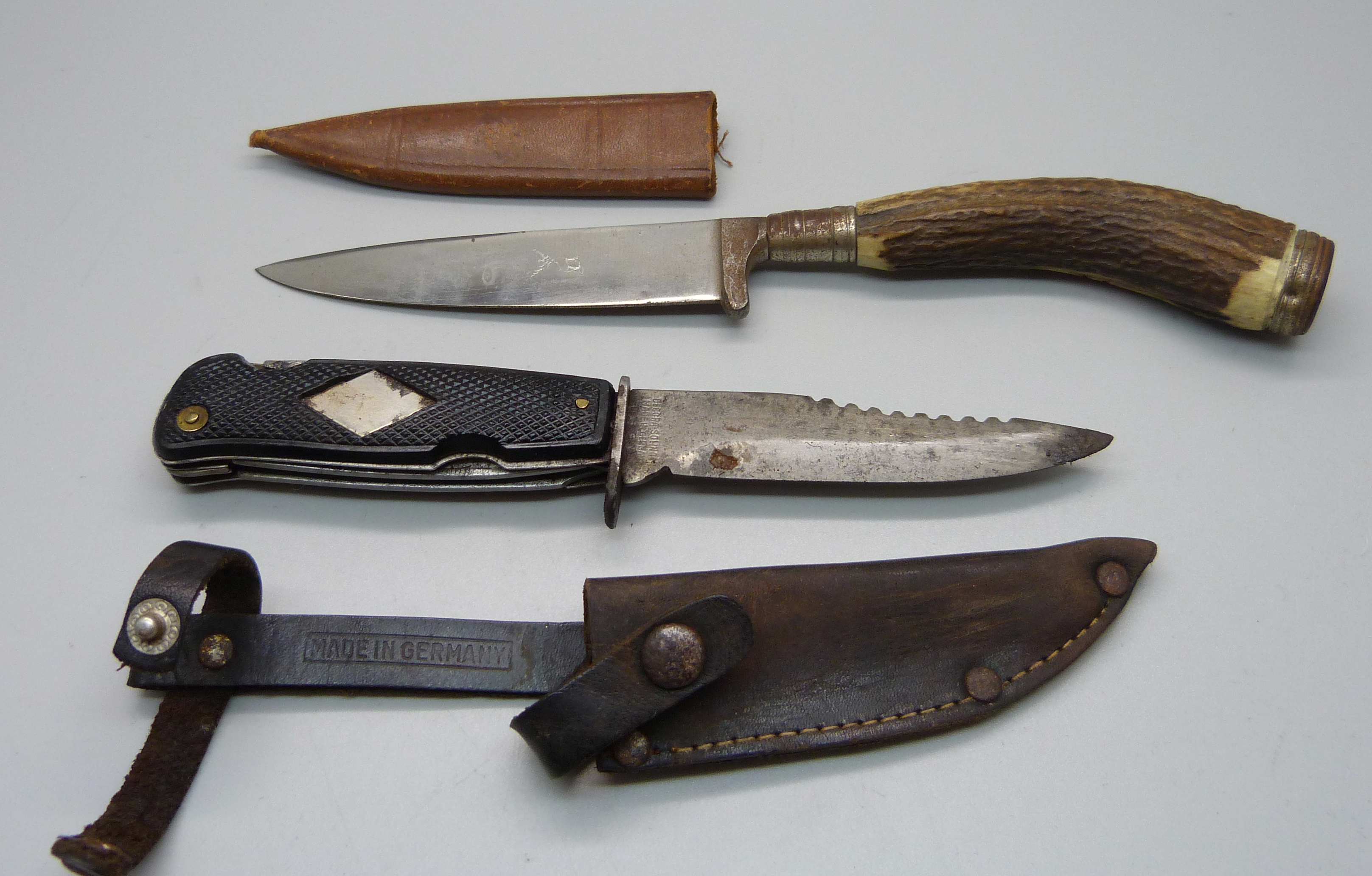 A German scout knife, the blade marked Solingen, and a hunting knife