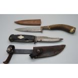 A German scout knife, the blade marked Solingen, and a hunting knife