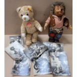 A Steiff Teddy bear and a Steiff Mecki doll with accompanying postcards