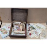 A box of Edwardian and later postcards and greetings cards
